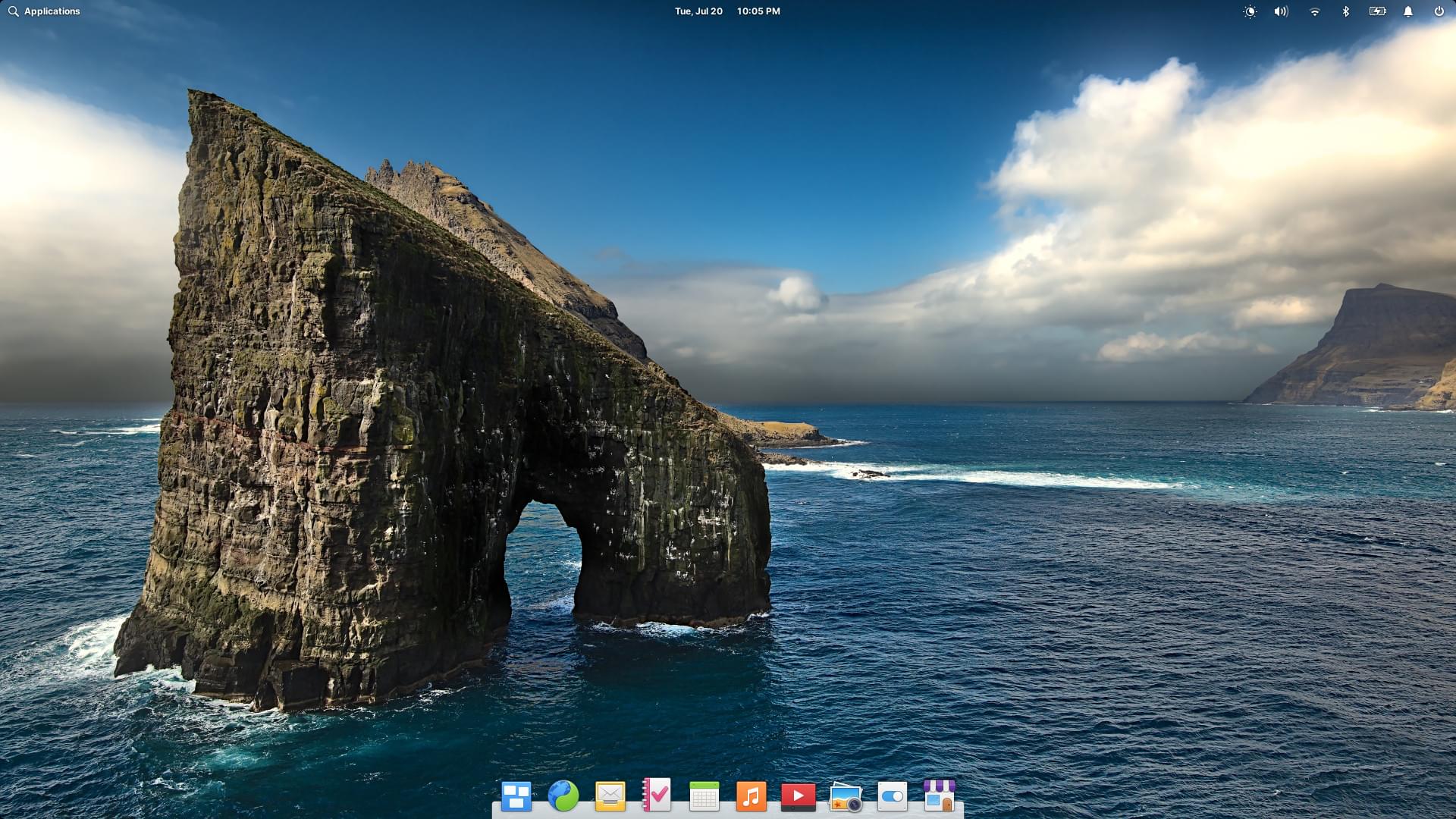 Elementary OS desktop UI; dock at the bottom, and the top bar Elementary OS desktop UI; dock at the bottom, and the top bar